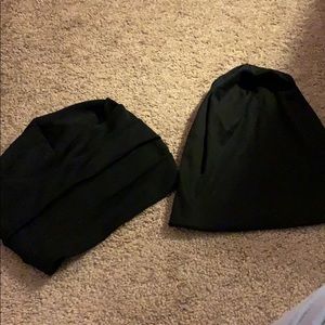 Two black beanies. Hijab caps.